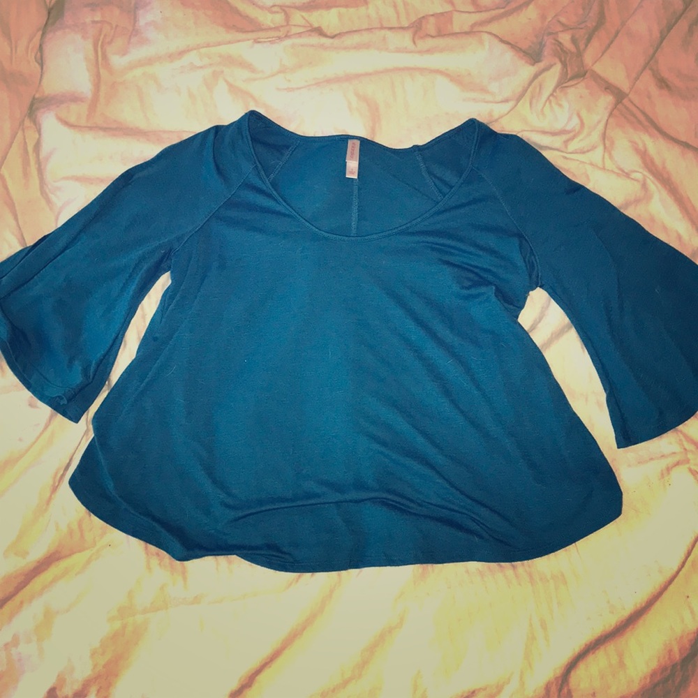 Blue shirt with slit arms